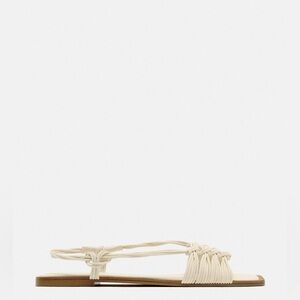 Zara women’s sz 9 low heeled knotted sandal - white

No tags but never worn